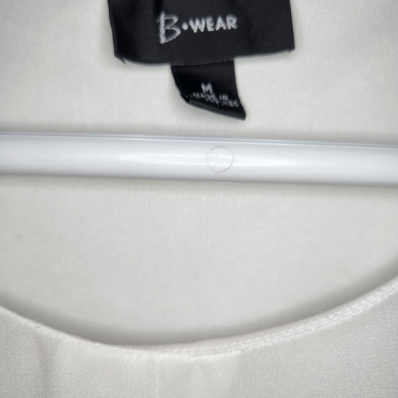 Flowing White Top with flare sleeves and a mid rise waist - Picture 2 of 5